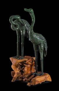 A Pair of Massive Spinach Jade Figures of Cranes Height 48 inches. — 20TH CENTURY