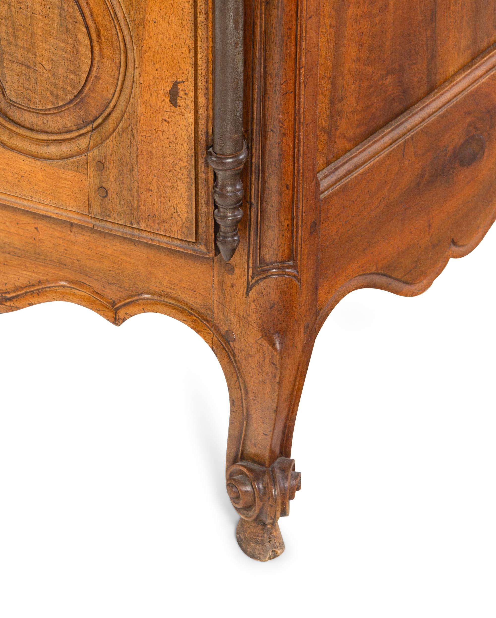A Louis XV Provincial Walnut Serving Cabinet