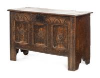 A Charles II Carved Oak Plank Chest