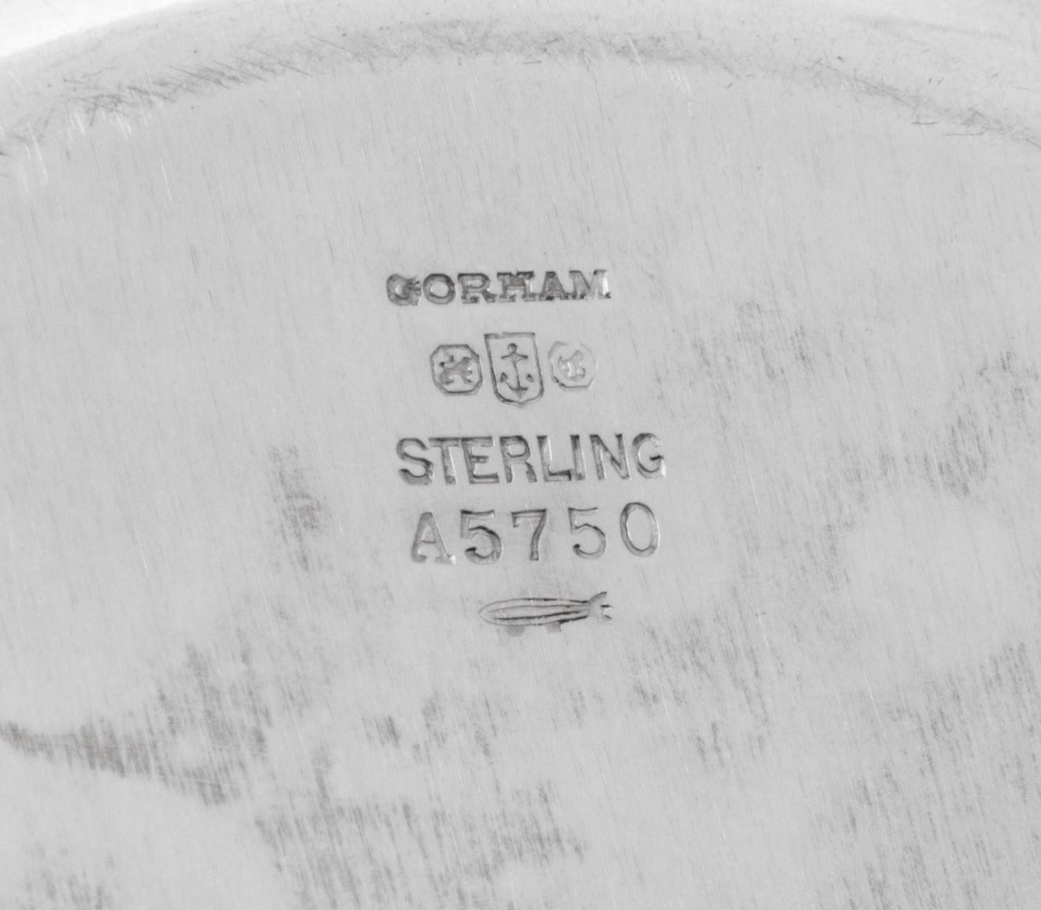 A Set of Twelve American Silver Bread Plates