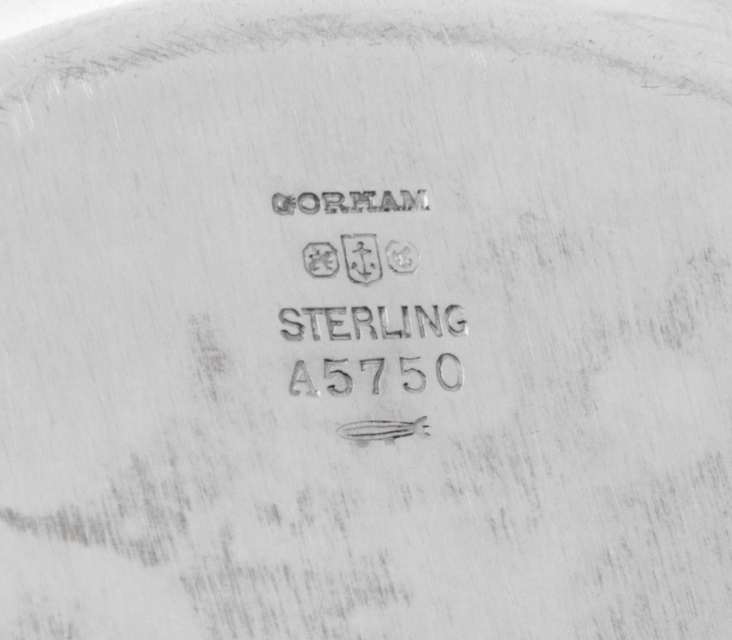 A Set of Twelve American Silver Bread Plates