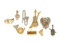 COLLECTION OF MUSICAL INSTRUMENT AND MUSIC THEMED COSTUME JEWELRY PINS