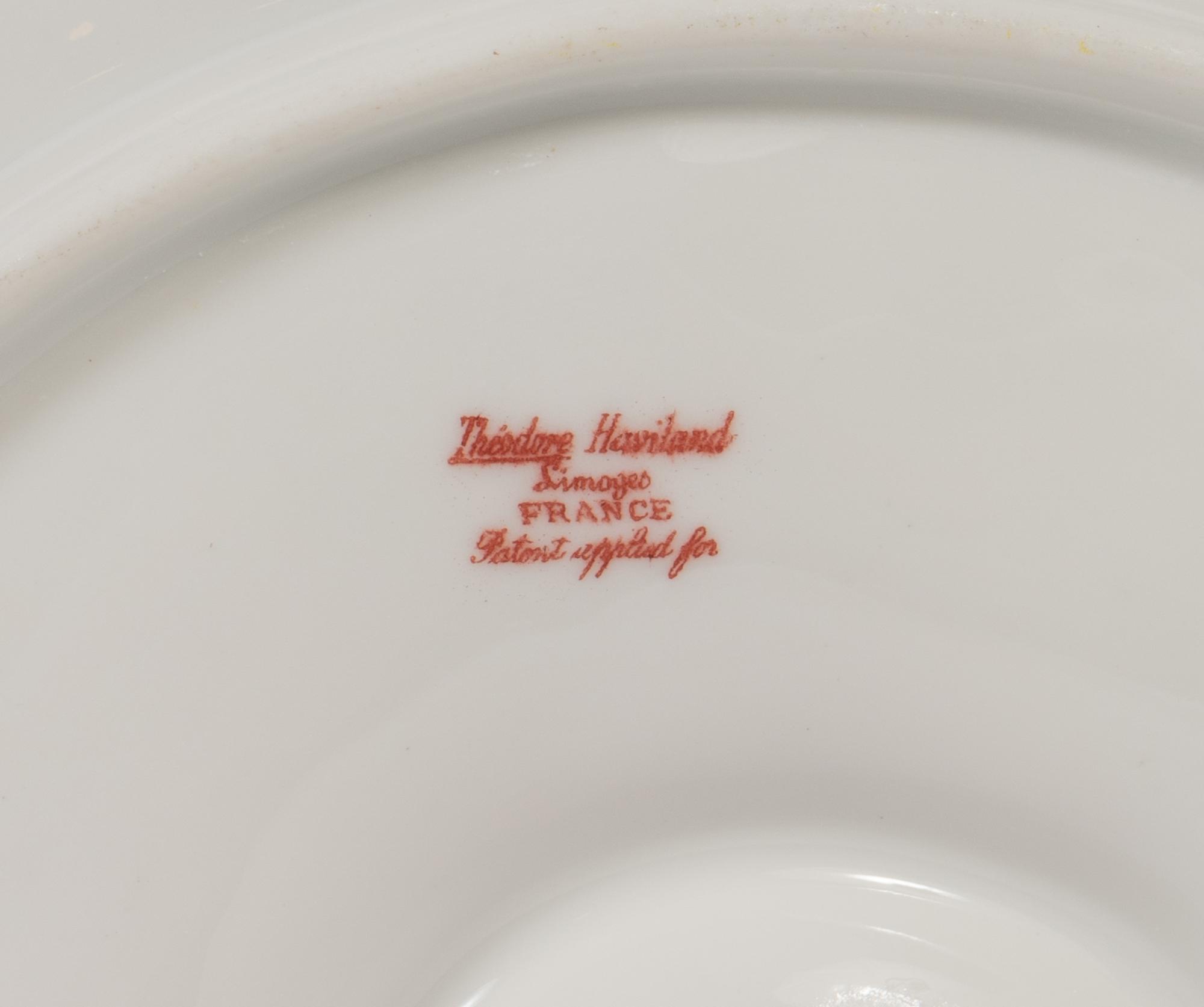 A Set of Six Theodore Haviland Limoges Porcelain Oyster Plates