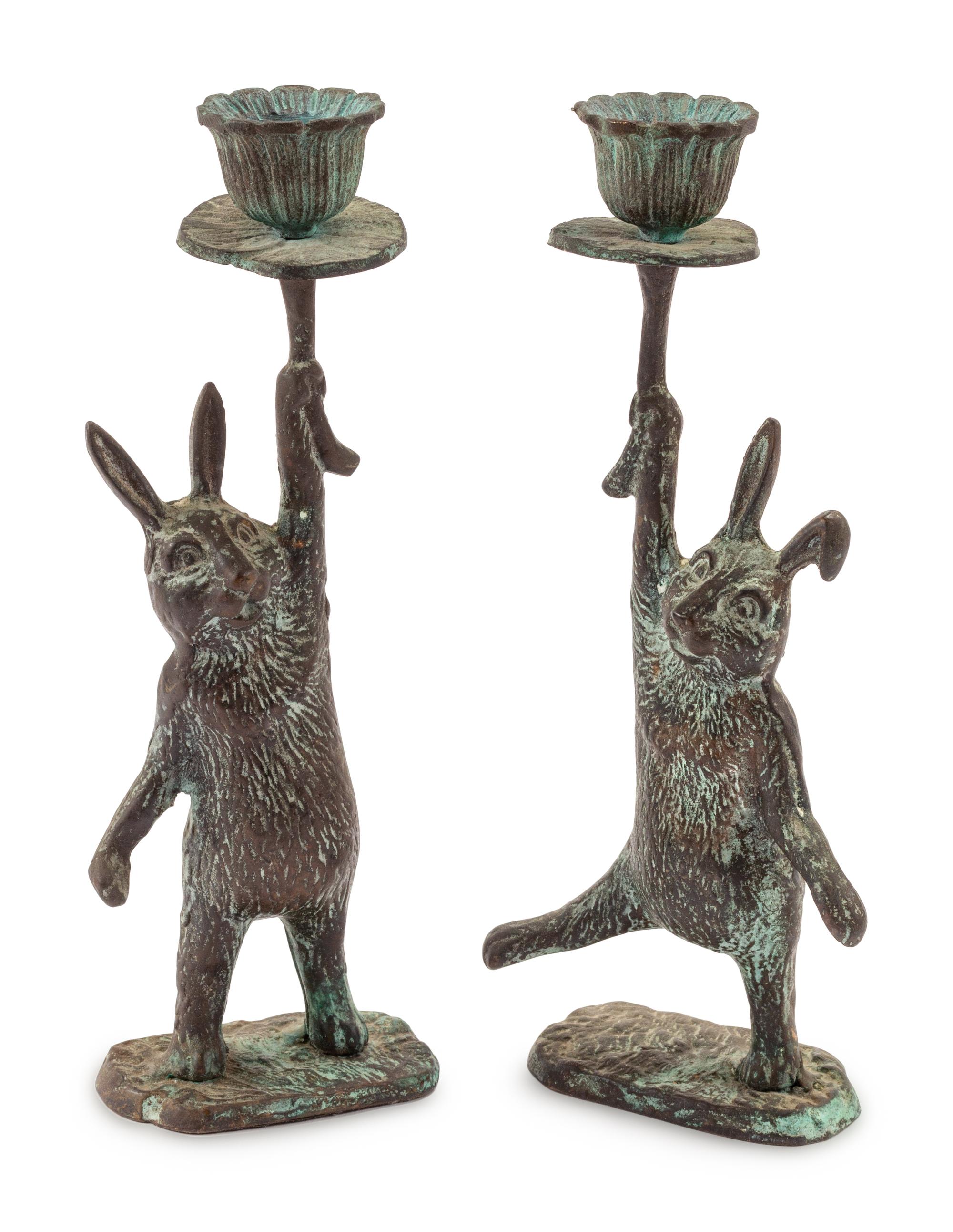 A Pair of Patinated Cast Metal Rabbit Candlesticks
