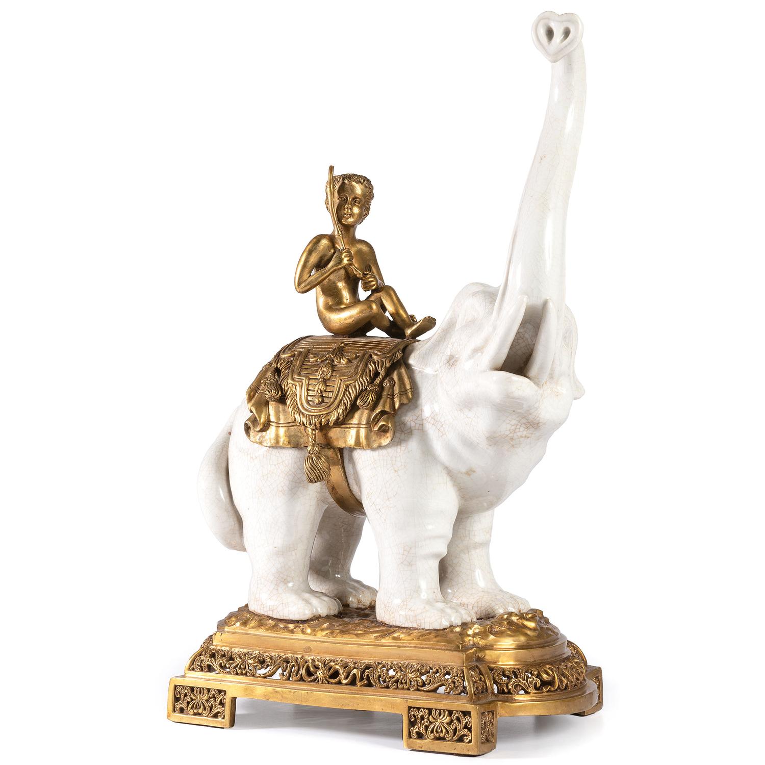 A Brass and Earthenware Elephant Figure