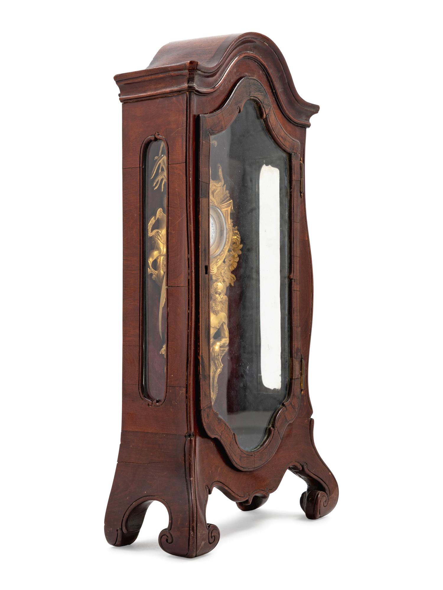 A Continental Walnut Clock Case
