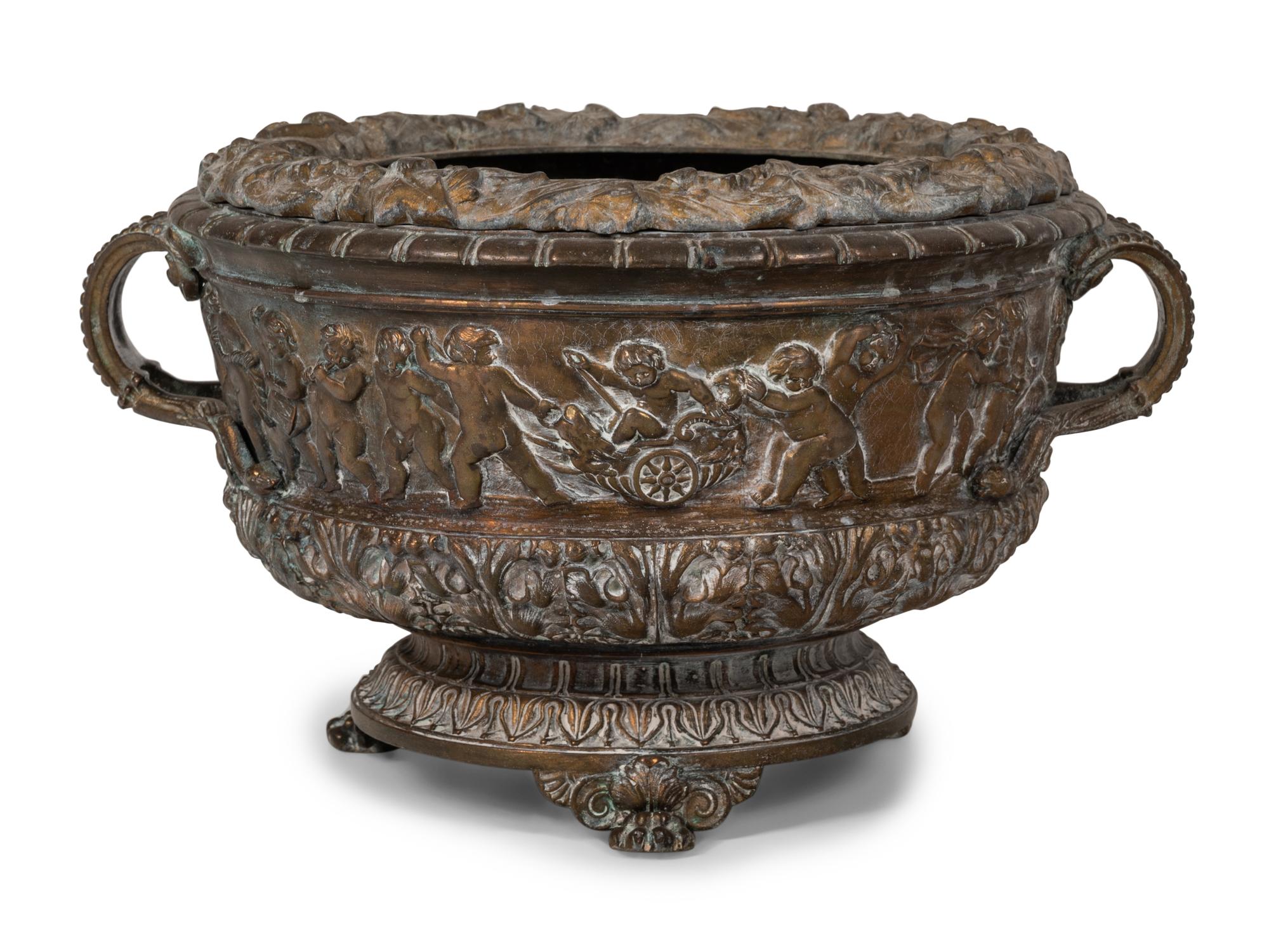 A Brass Two-Handled Jardinière with Bacchic Figures