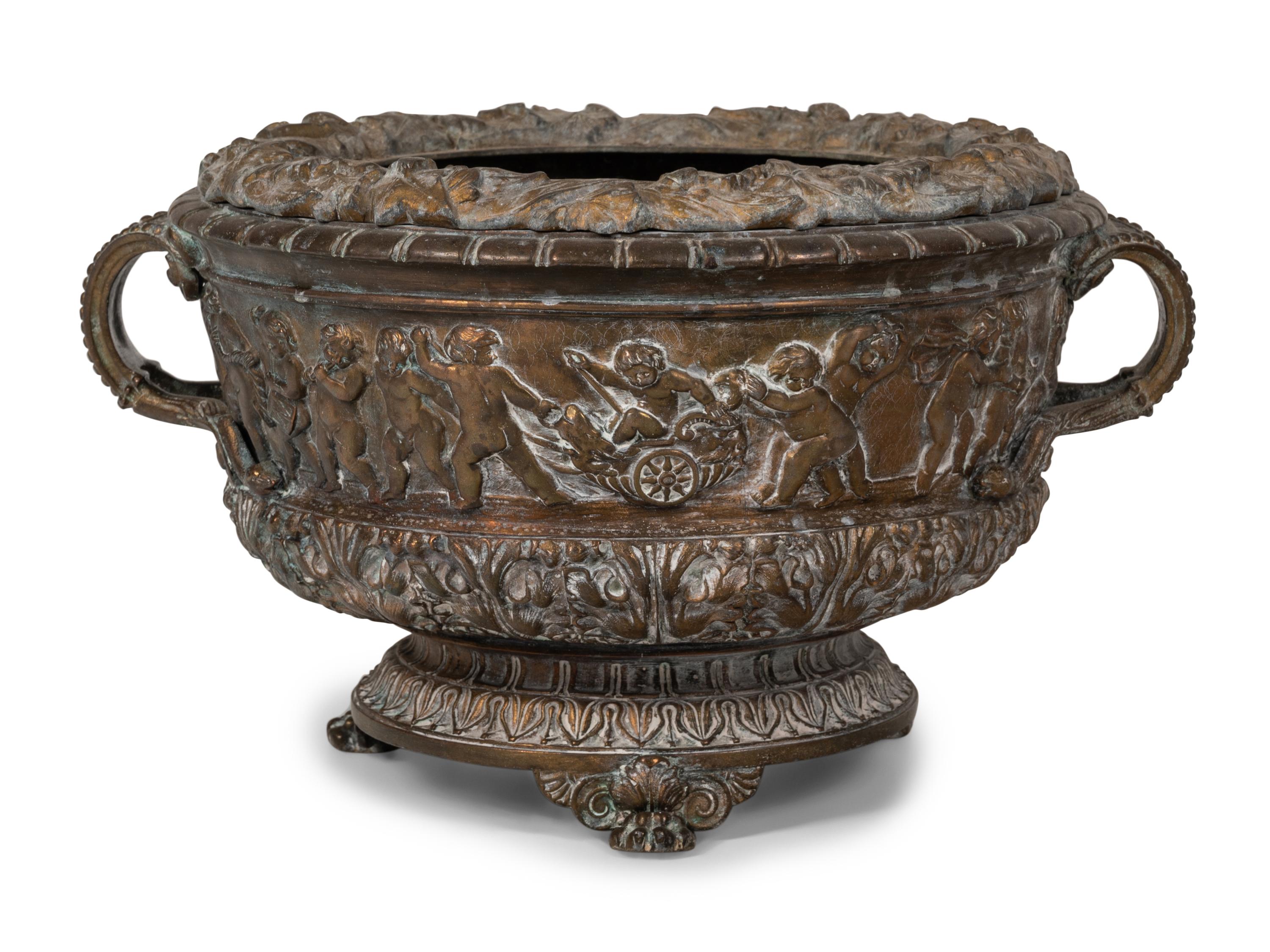 A Brass Two-Handled Jardinière with Bacchic Figures