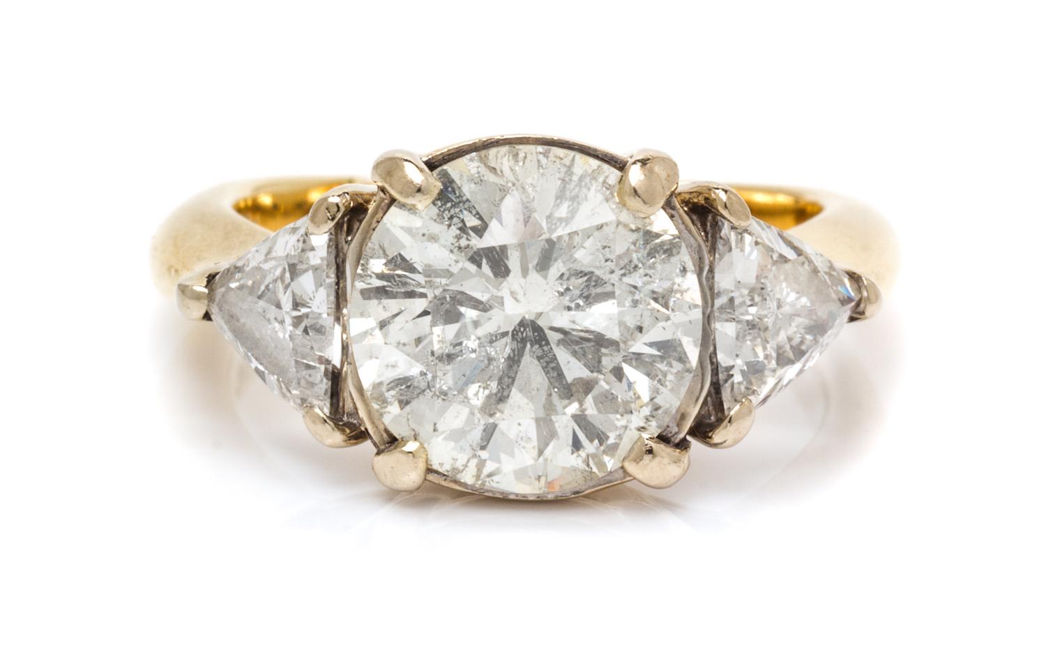 A 14 Karat Yellow Gold and Diamond Ring, 6.10 dwts.