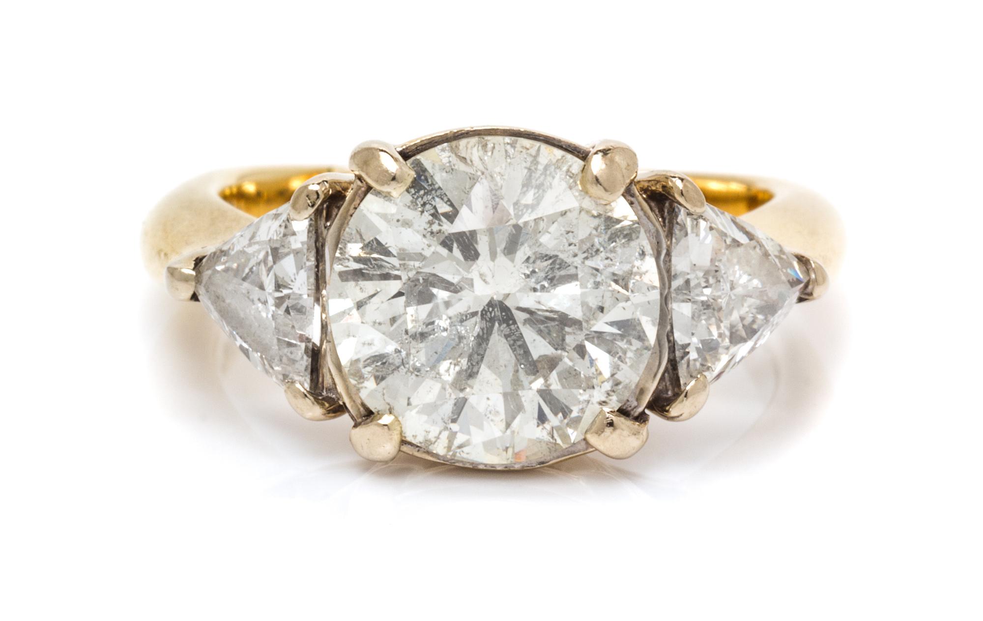 A 14 Karat Yellow Gold and Diamond Ring, 6.10 dwts.