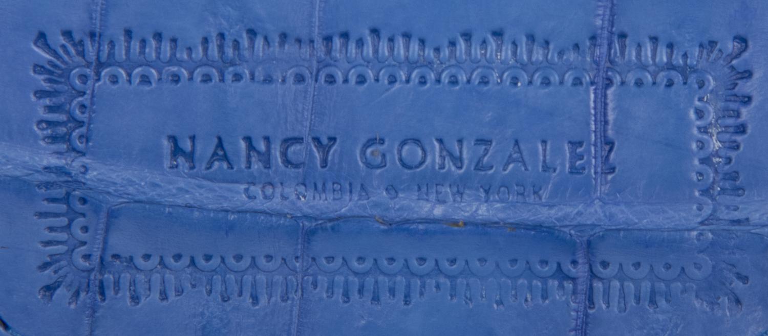 NANCY GONZALEZ, TWO HANDBAGS