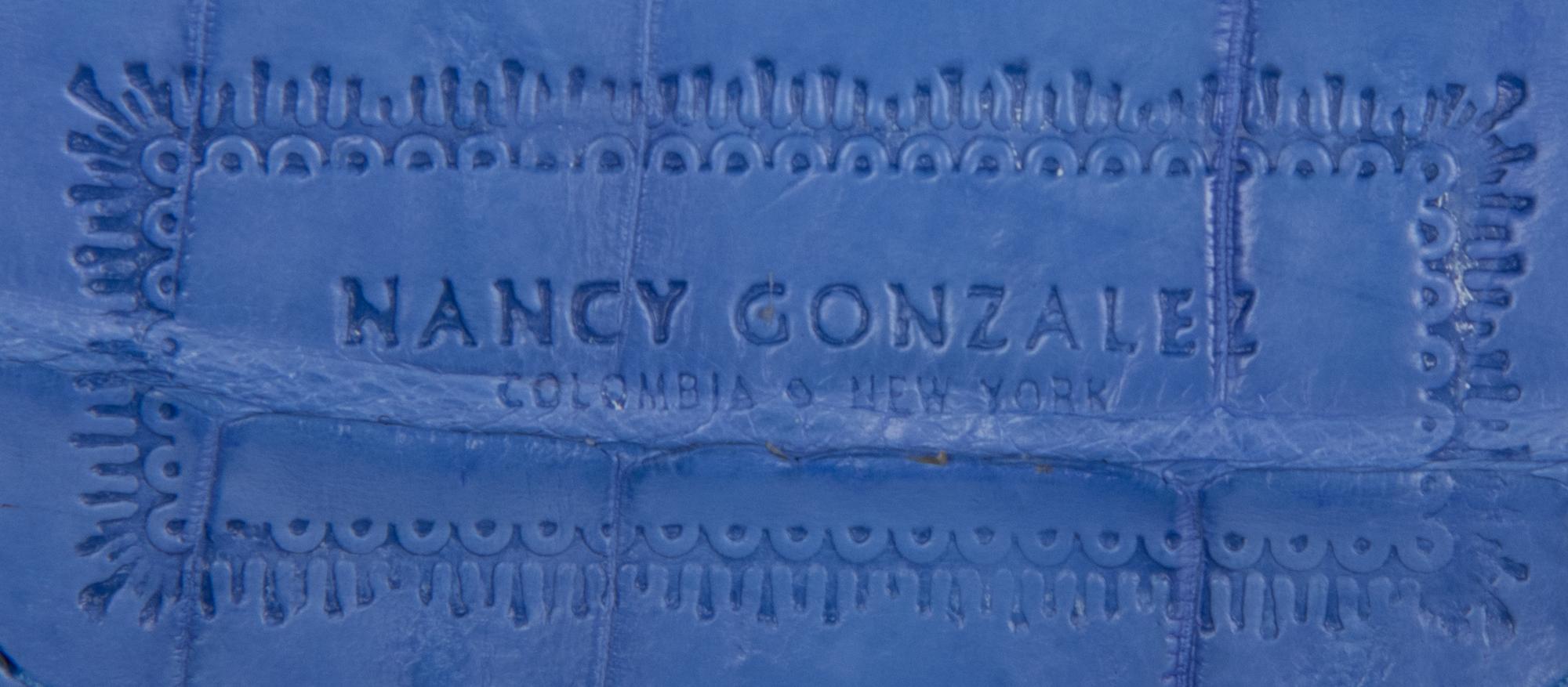 NANCY GONZALEZ, TWO HANDBAGS