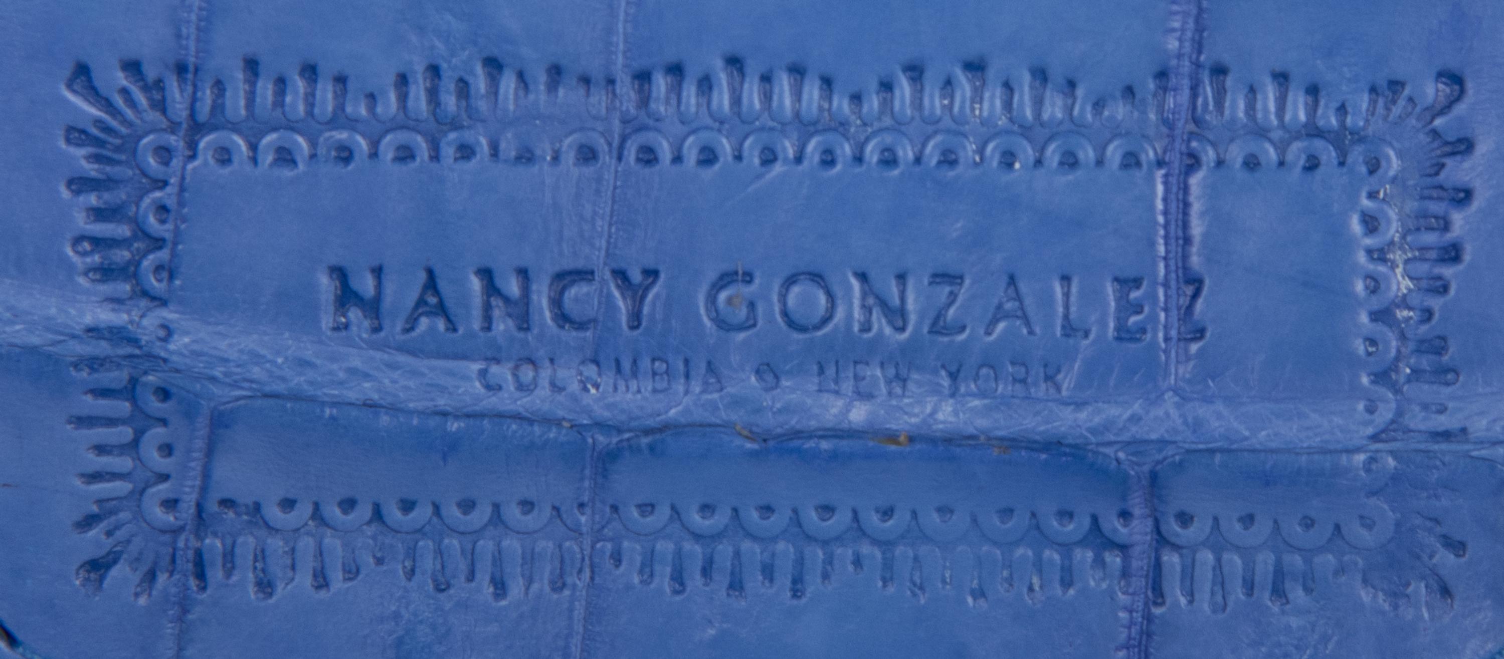NANCY GONZALEZ, TWO HANDBAGS
