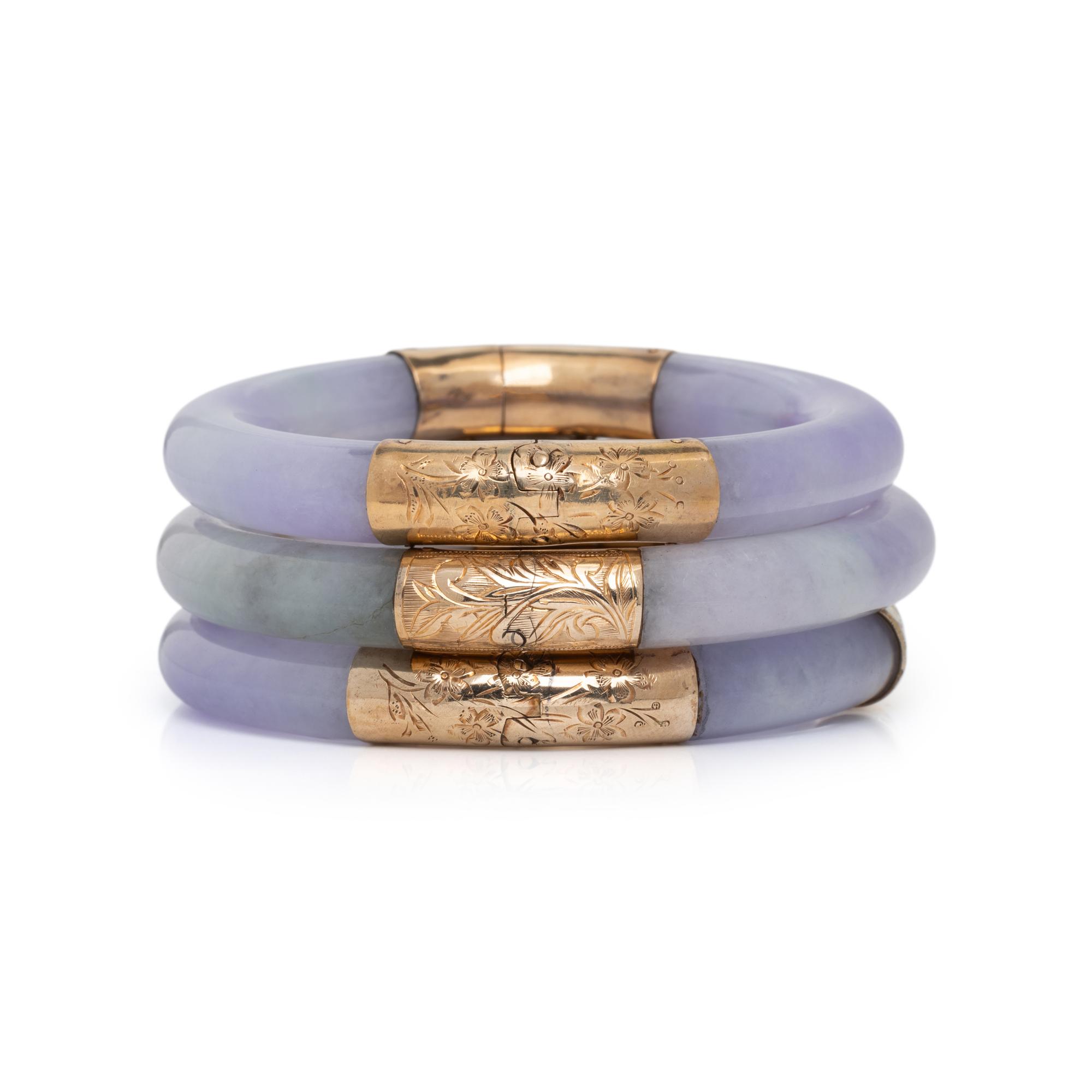 THREE JADE AND YELLOW GOLD BANGLE BRACELETS