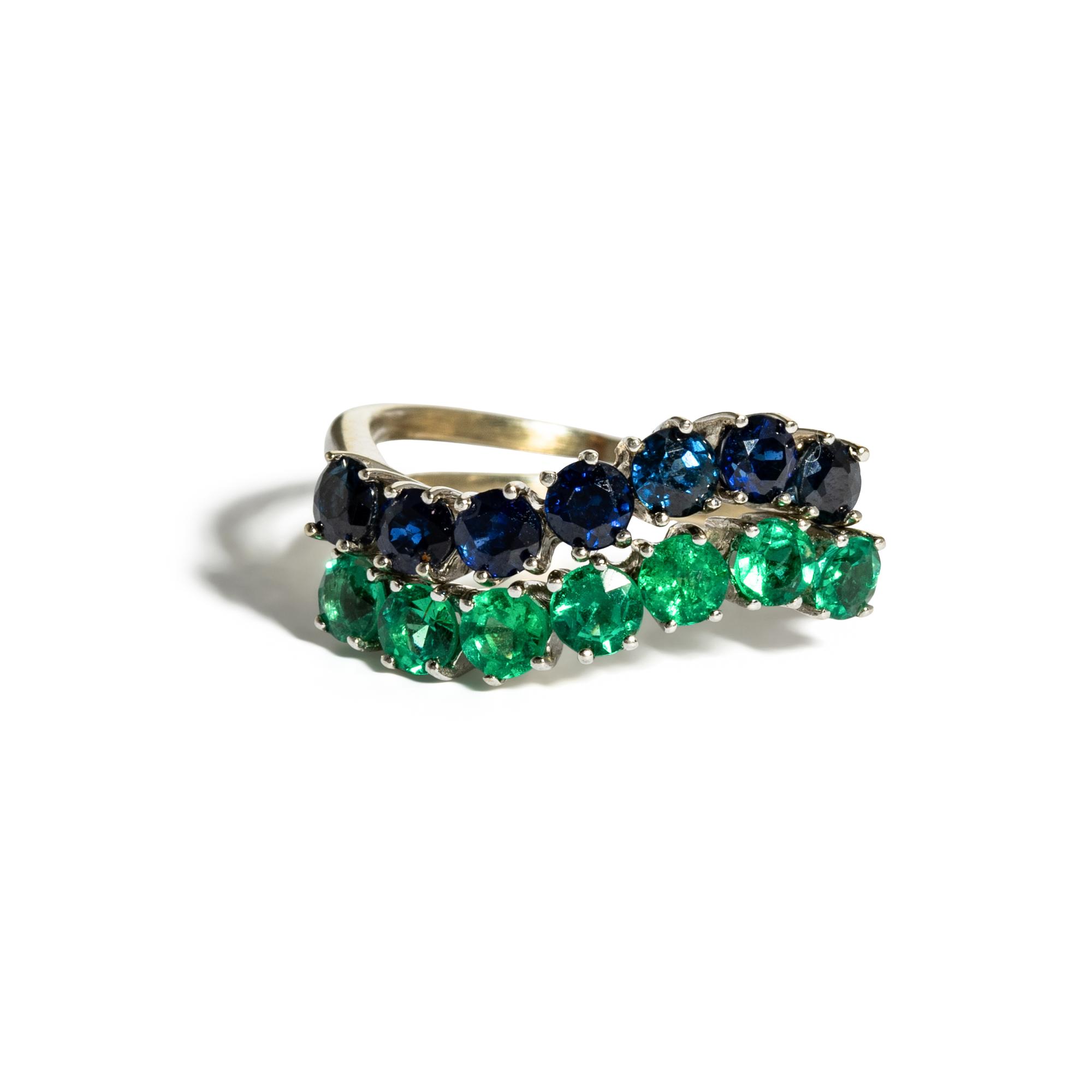 PAIR OF WHITE GOLD, SAPPHIRE, AND SYNTHETIC EMERALD RINGS