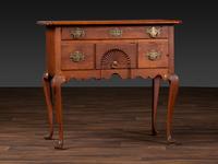 A Queen Anne Cherrywood and Maple Pad Foot Dressing Table