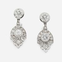 A pair of diamond and white gold earrings