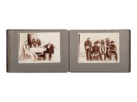 [NATIVE AMERICANS]. JONES, John Edward (1863-1922), photographer. Album containing 50 photographs of the San Carlos Indian Agency, including Apache civilians and police, agency buildings and dwellings, and scenic views. Ca 1904.