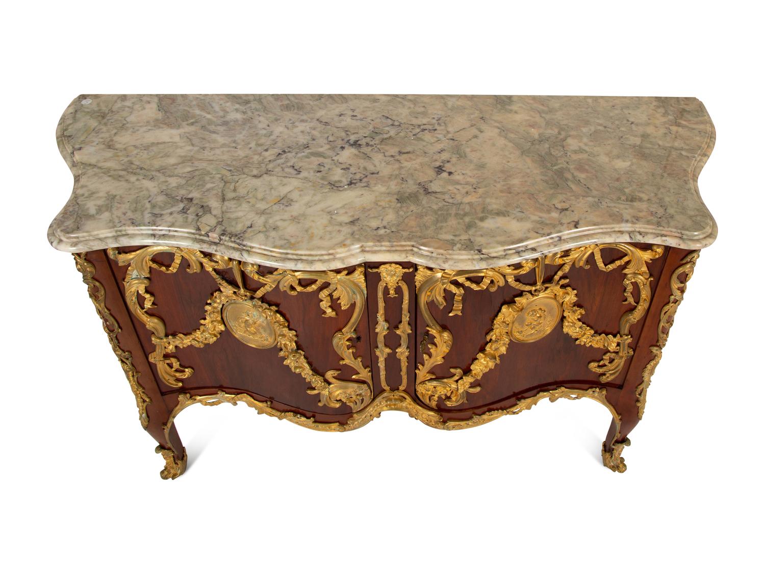 A Régence Style Gilt Bronze Mounted Mahogany Marble-Top Commode — Early 20th century