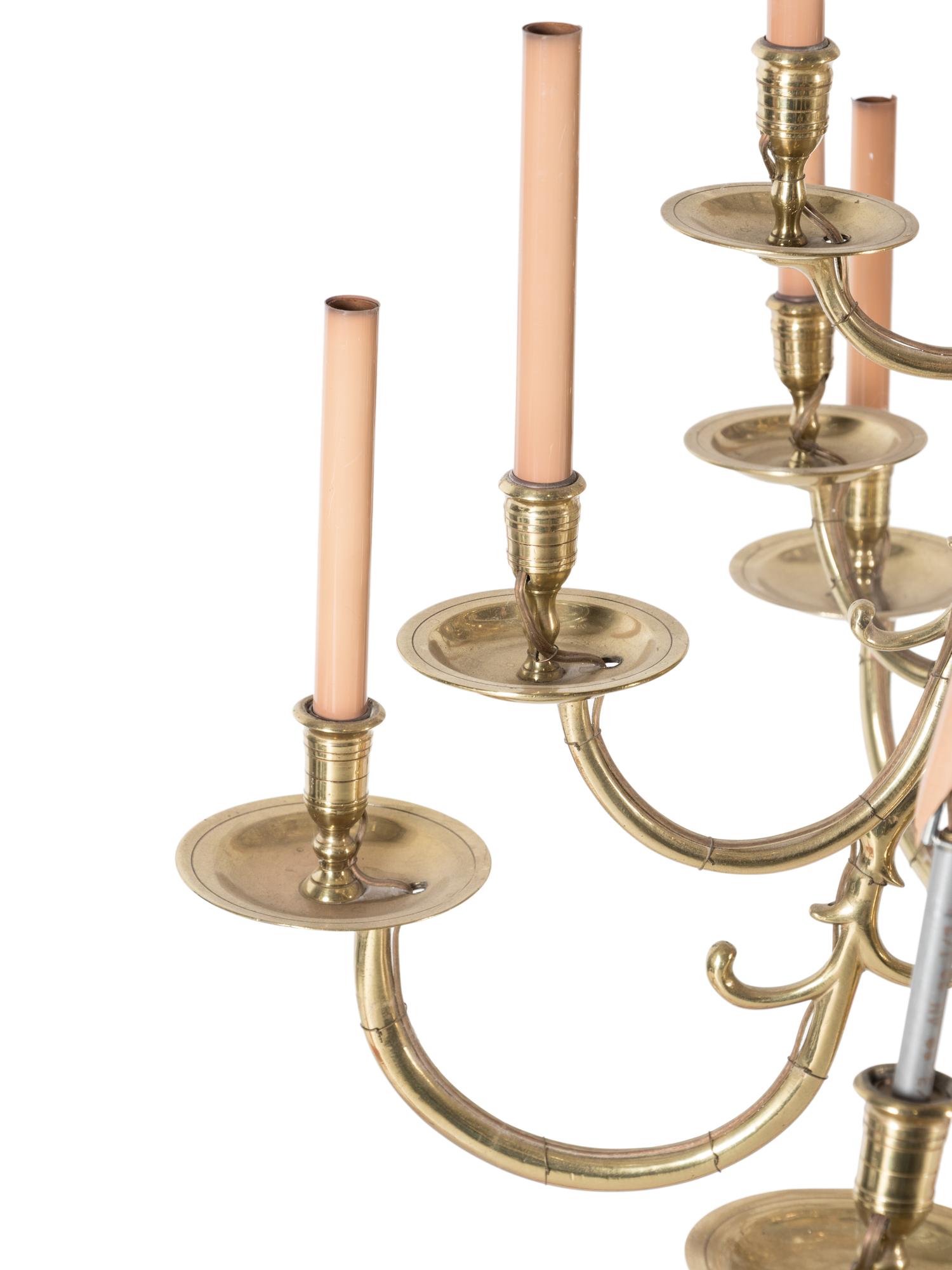 A Dutch Baroque Style Brass Eighteen-Light Chandelier