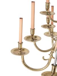 A Dutch Baroque Style Brass Eighteen-Light Chandelier