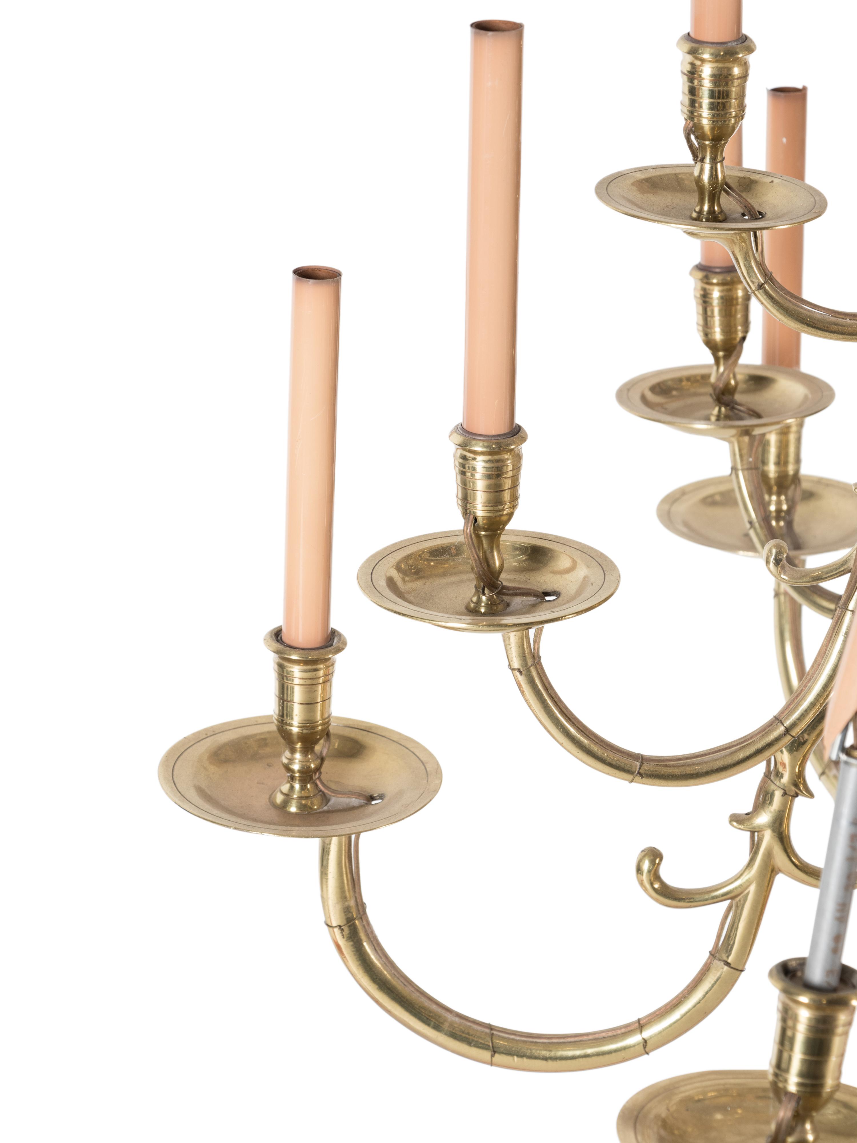 A Dutch Baroque Style Brass Eighteen-Light Chandelier