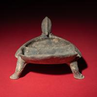 A Chinese Grey Pottery Mandarin Duck-Form Inkstone, Six Dynasties — 六朝 灰陶鴛鴦硯