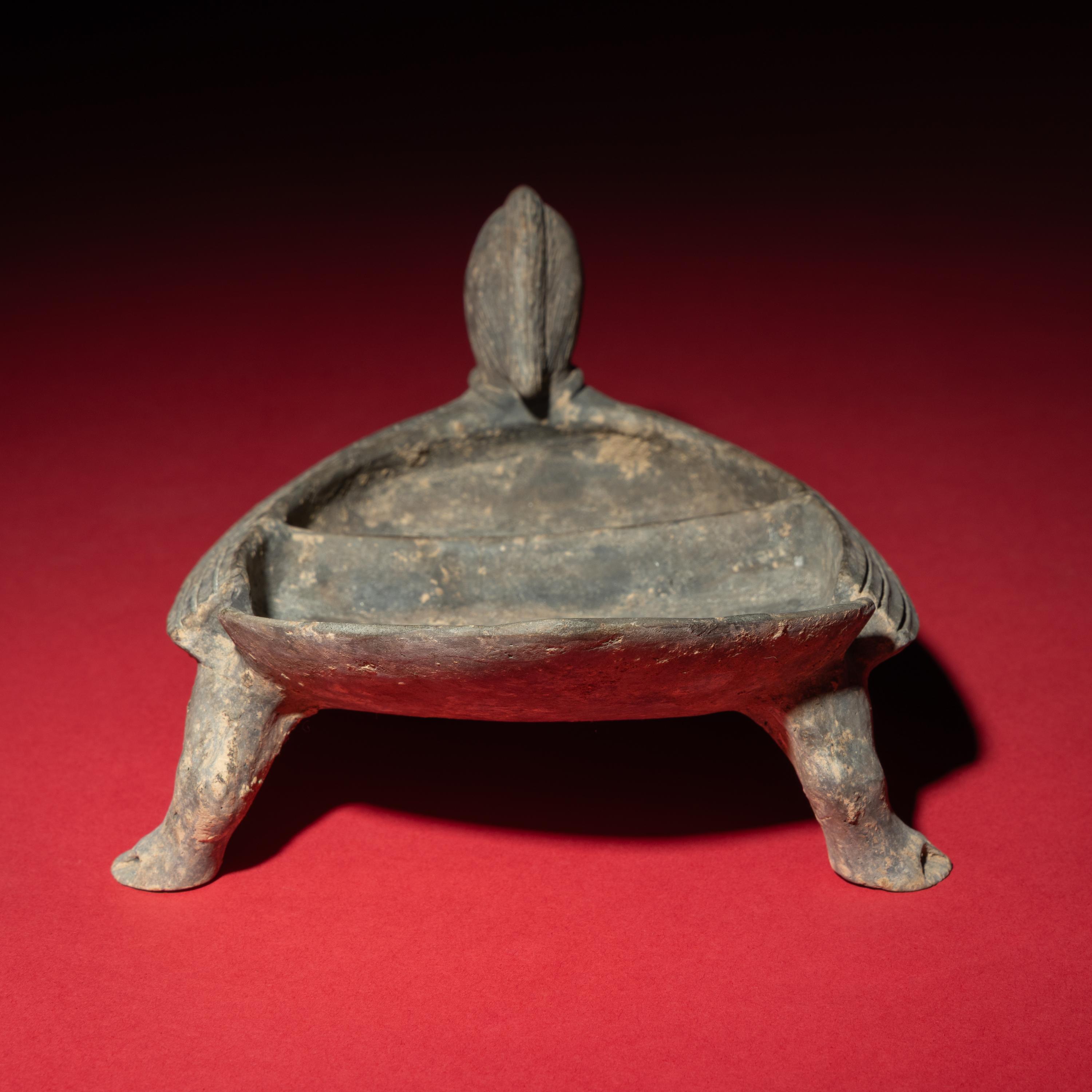 A Chinese Grey Pottery Mandarin Duck-Form Inkstone, Six Dynasties — 六朝 灰陶鴛鴦硯