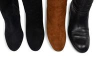 Four Pairs of Boots by Valentino, Gucci, and Christian Dior