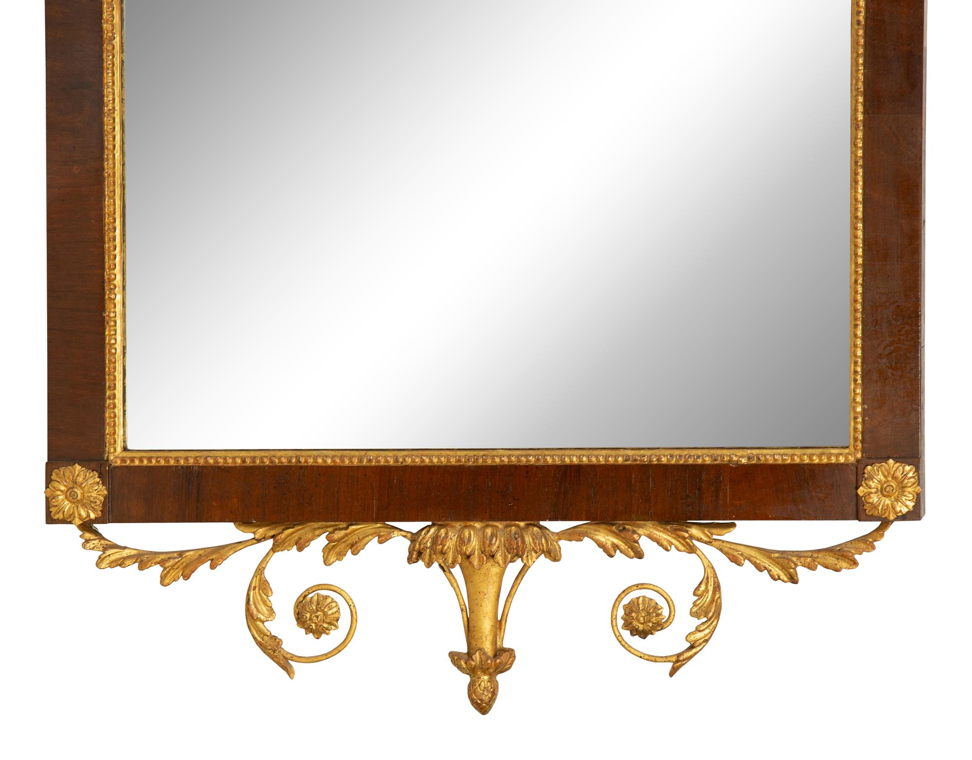 An Italian Neoclassical Style Giltwood and Mahogany Mirror