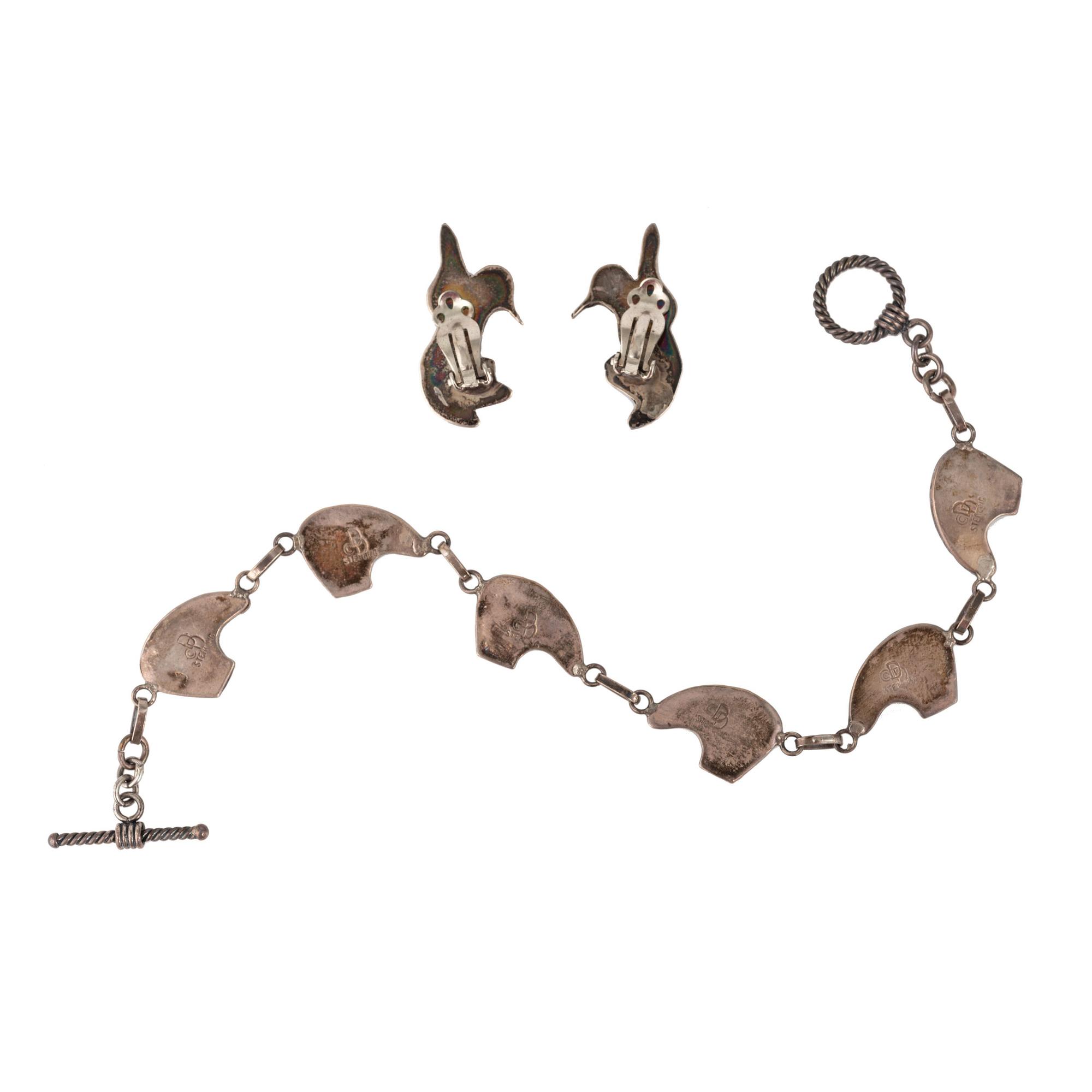 Selection of Navajo, Hopi, and Zuni Silver Bracelets and Earrings, with Inlay