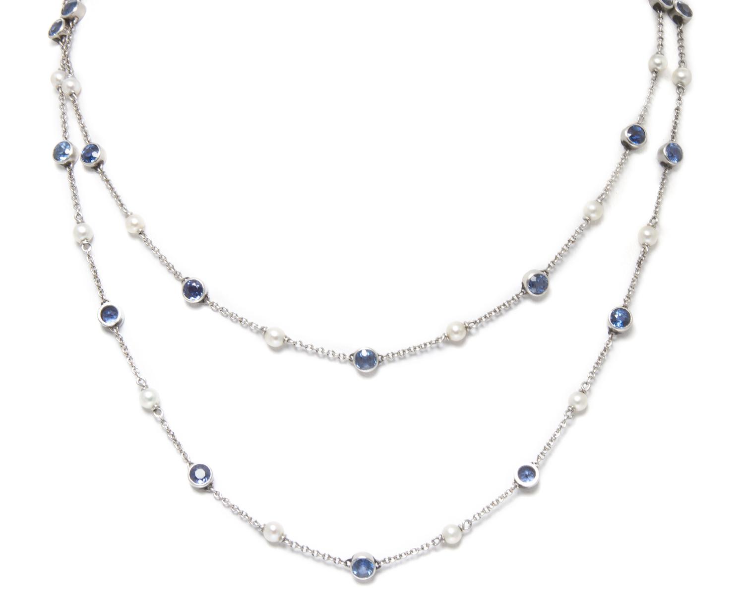 A Vintage Platinum, Seed Pearl and Sapphire Longchain Necklace, 7.40 dwts.
