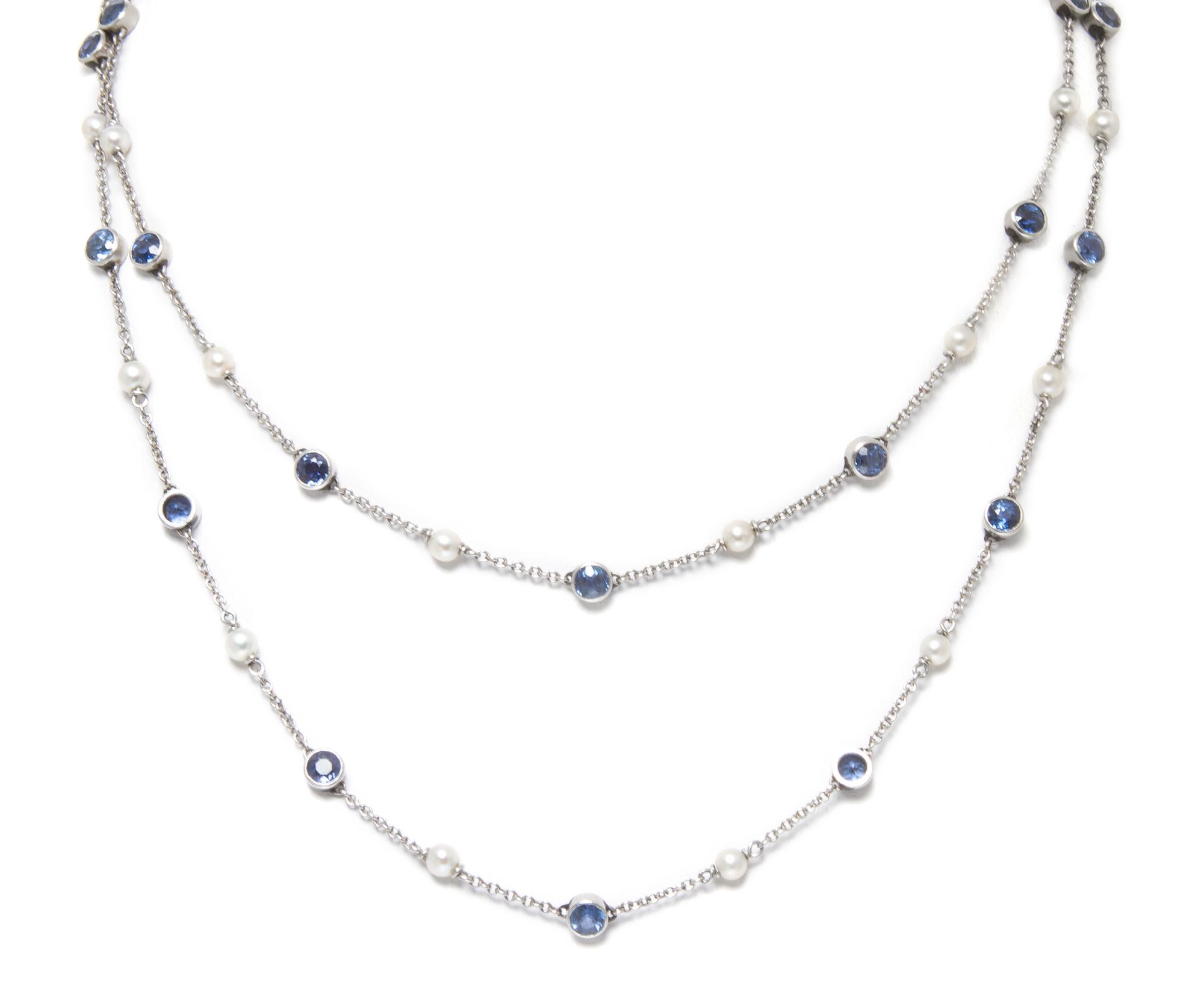 A Vintage Platinum, Seed Pearl and Sapphire Longchain Necklace, 7.40 dwts.