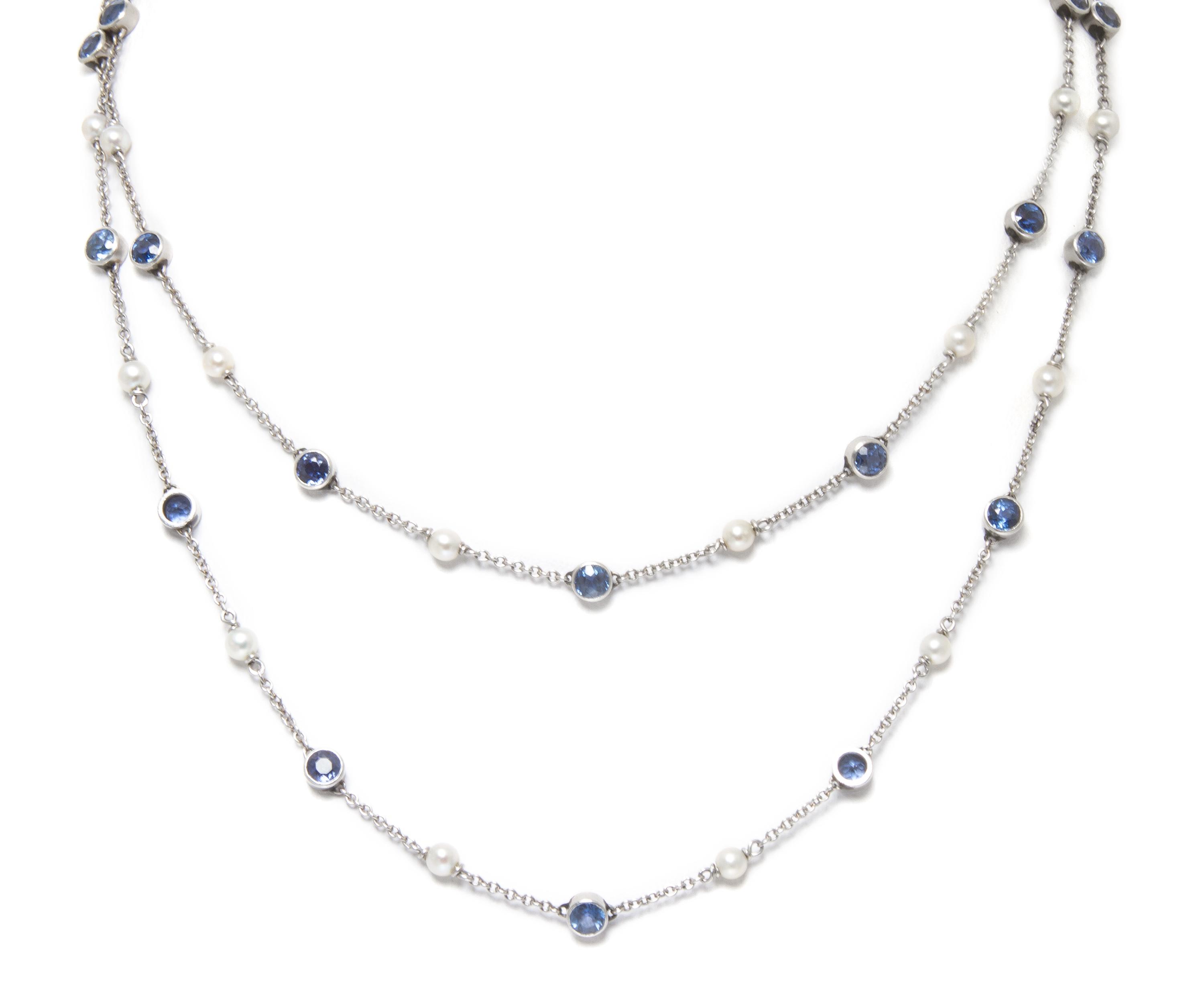 A Vintage Platinum, Seed Pearl and Sapphire Longchain Necklace, 7.40 dwts.