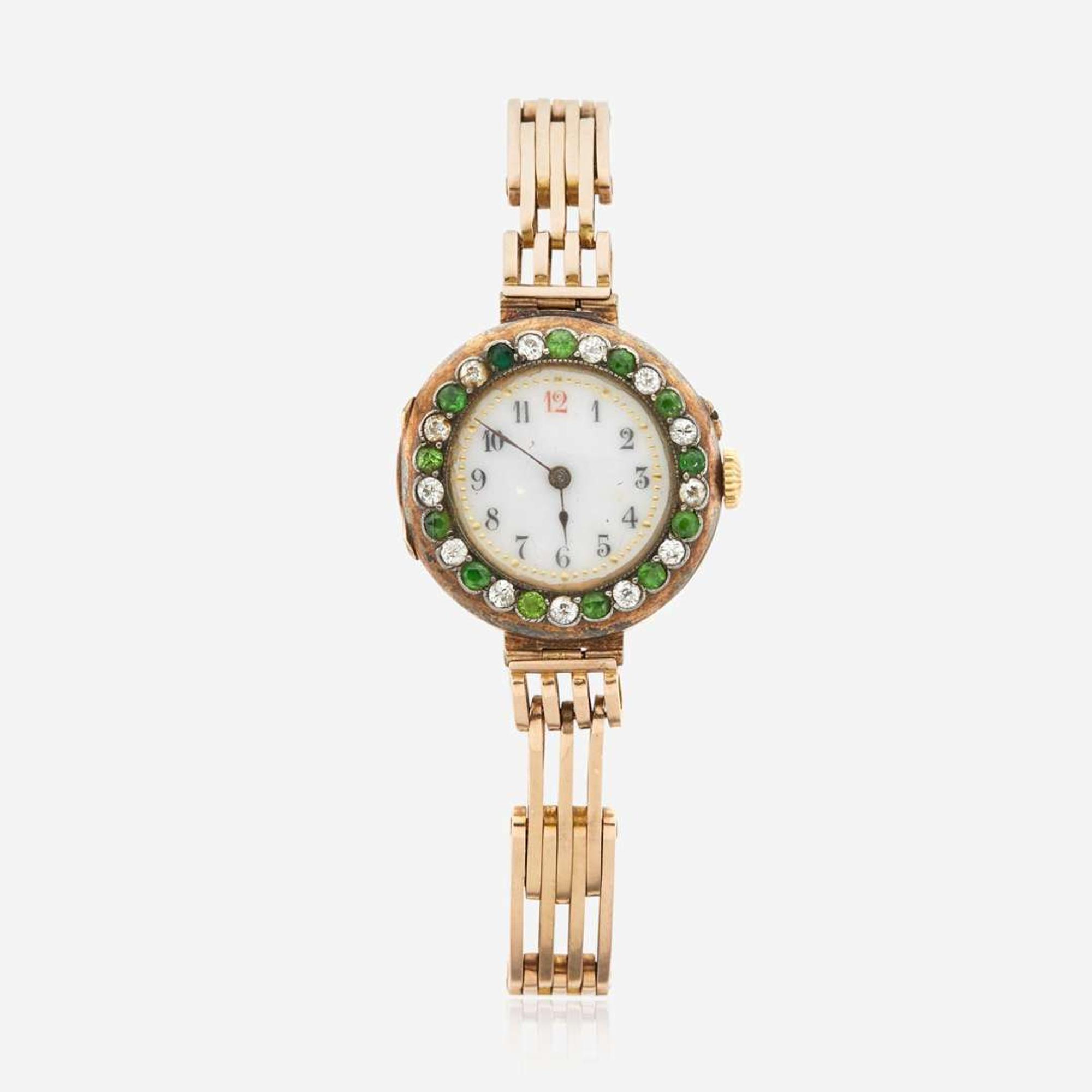 A gold, diamond, and green stone bracelet watch, Swiss C.1909