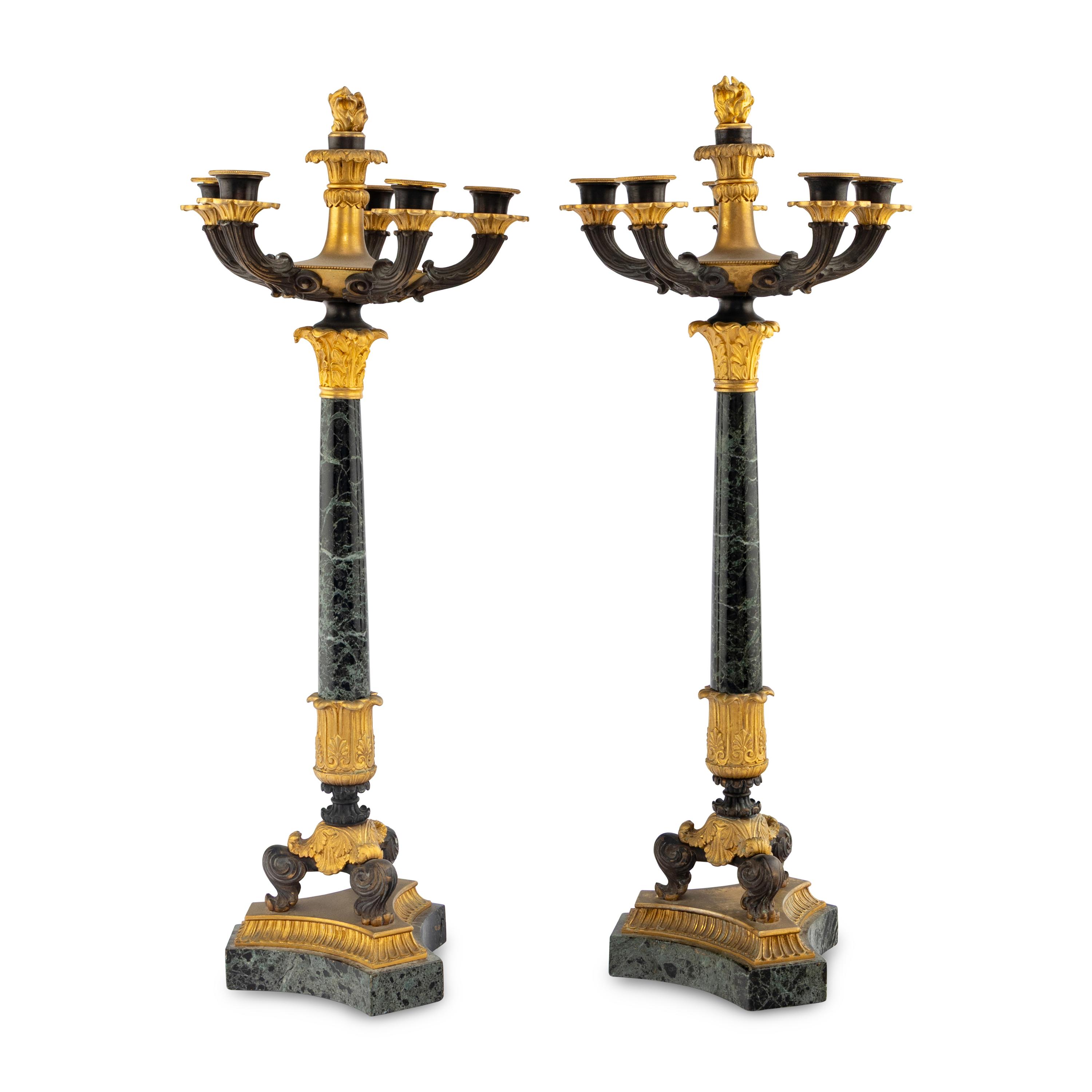 A Pair of Charles X Gilt and Patinated Bronze Mounted Marble Seven-Light Candelabra