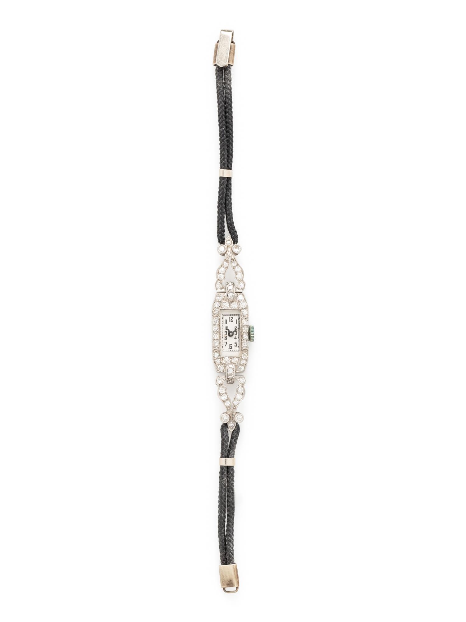 PLATINUM AND DIAMOND WATCH