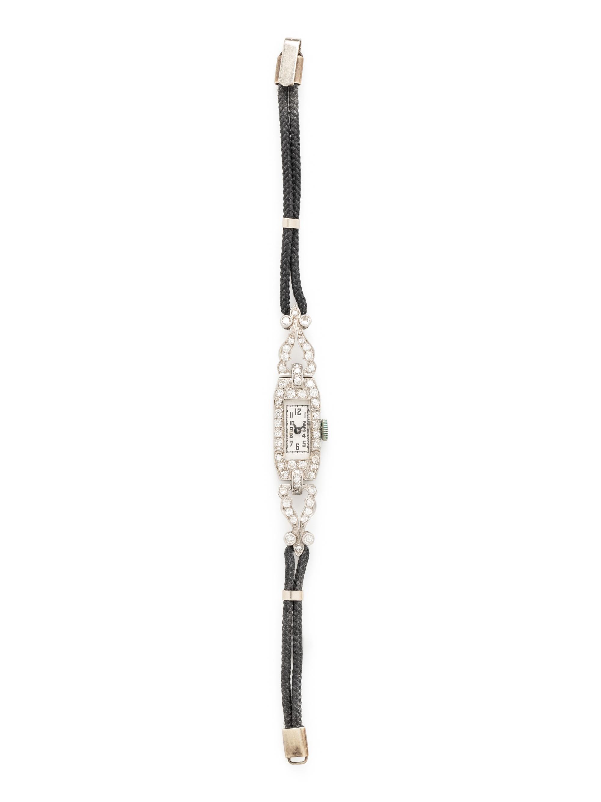 PLATINUM AND DIAMOND WATCH