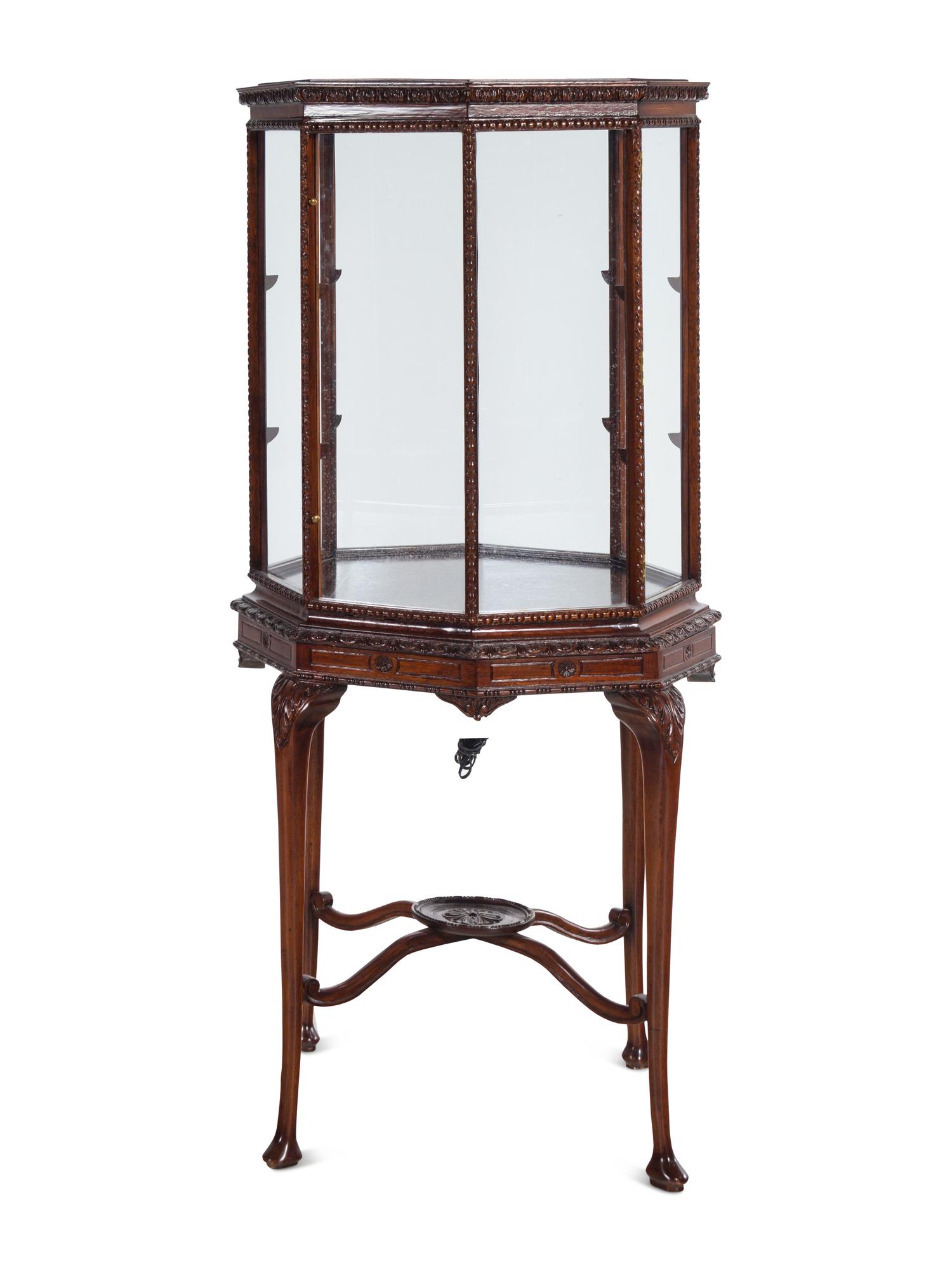 A George III Style Carved Mahogany Octagonal Vitrine