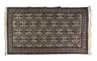 A Bokhara Wool Rug 9 feet 7 inches x 6 feet 6 inches.