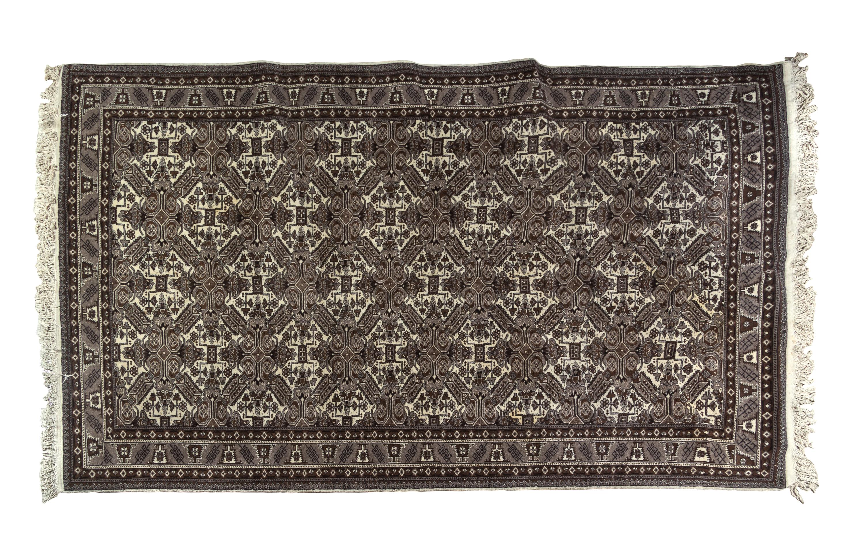 A Bokhara Wool Rug 9 feet 7 inches x 6 feet 6 inches.