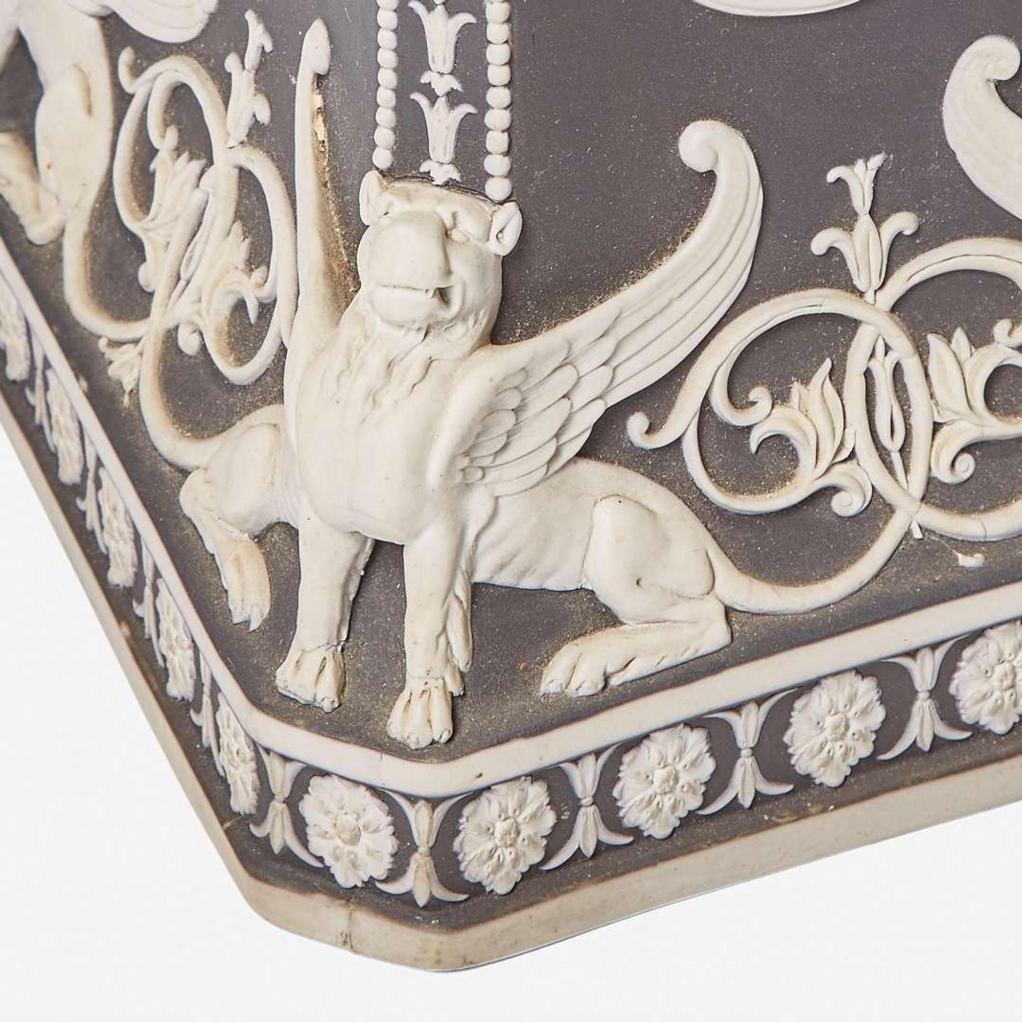 A Wedgwood Black Dip Jasperware Borghese Vase Cover and Stand UK, early 19th century