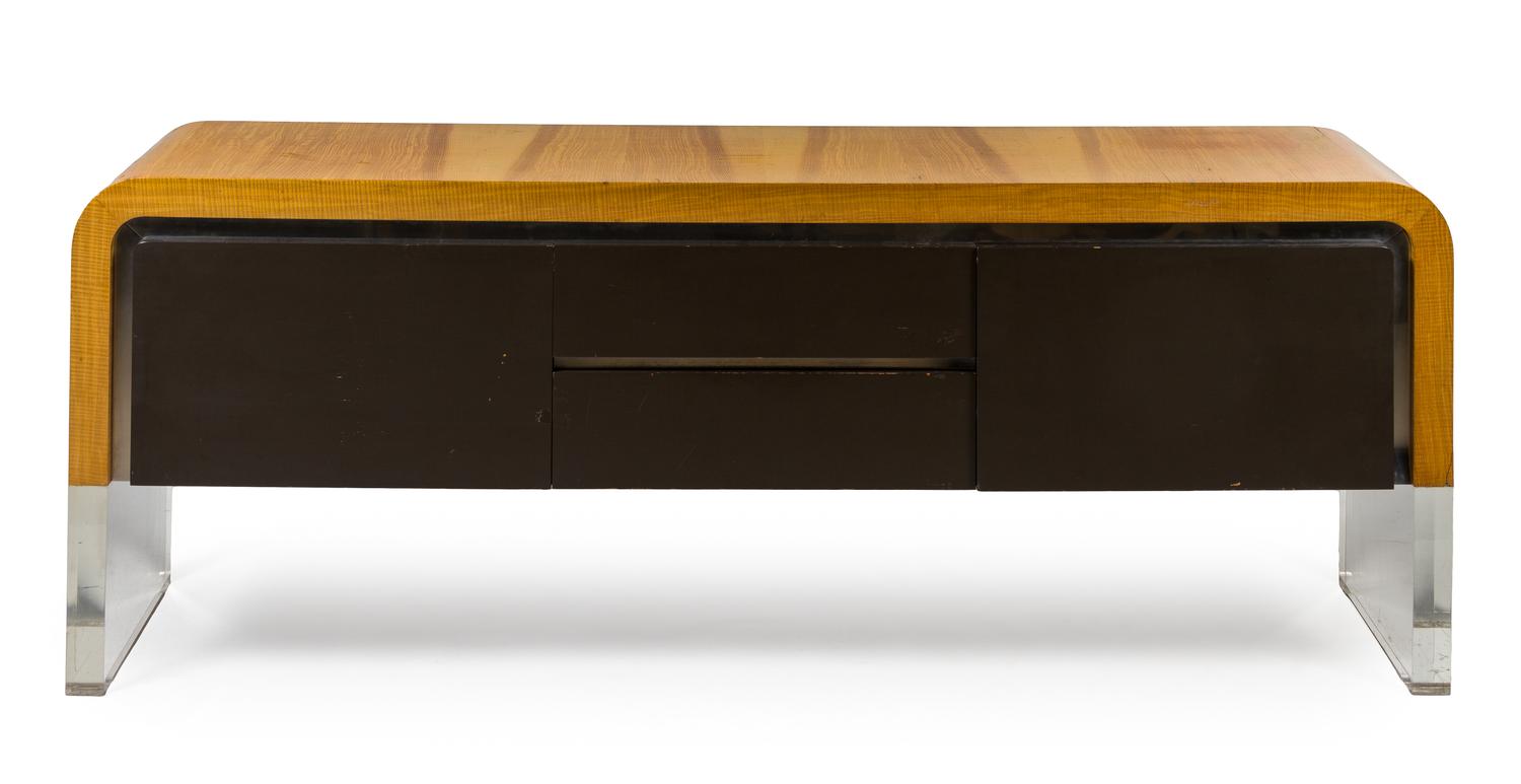 A Contemporary Satinwood Veneered Polymer and Chrome Ribbon Cabinet Height 28 x width 77 x depth 18 inches. — DESIGNED BY VLADIMIR KAGAN