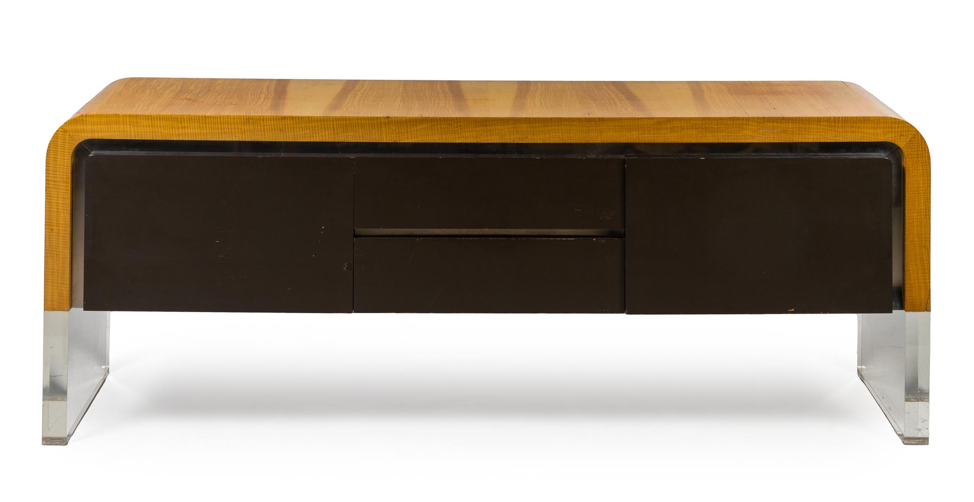 A Contemporary Satinwood Veneered Polymer and Chrome Ribbon Cabinet Height 28 x width 77 x depth 18 inches. — DESIGNED BY VLADIMIR KAGAN
