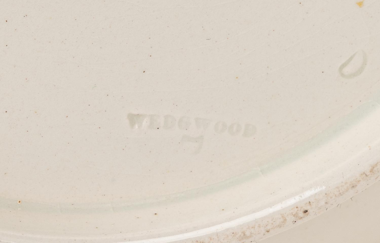A Pair of Wedgwood Porcelain Pitchers