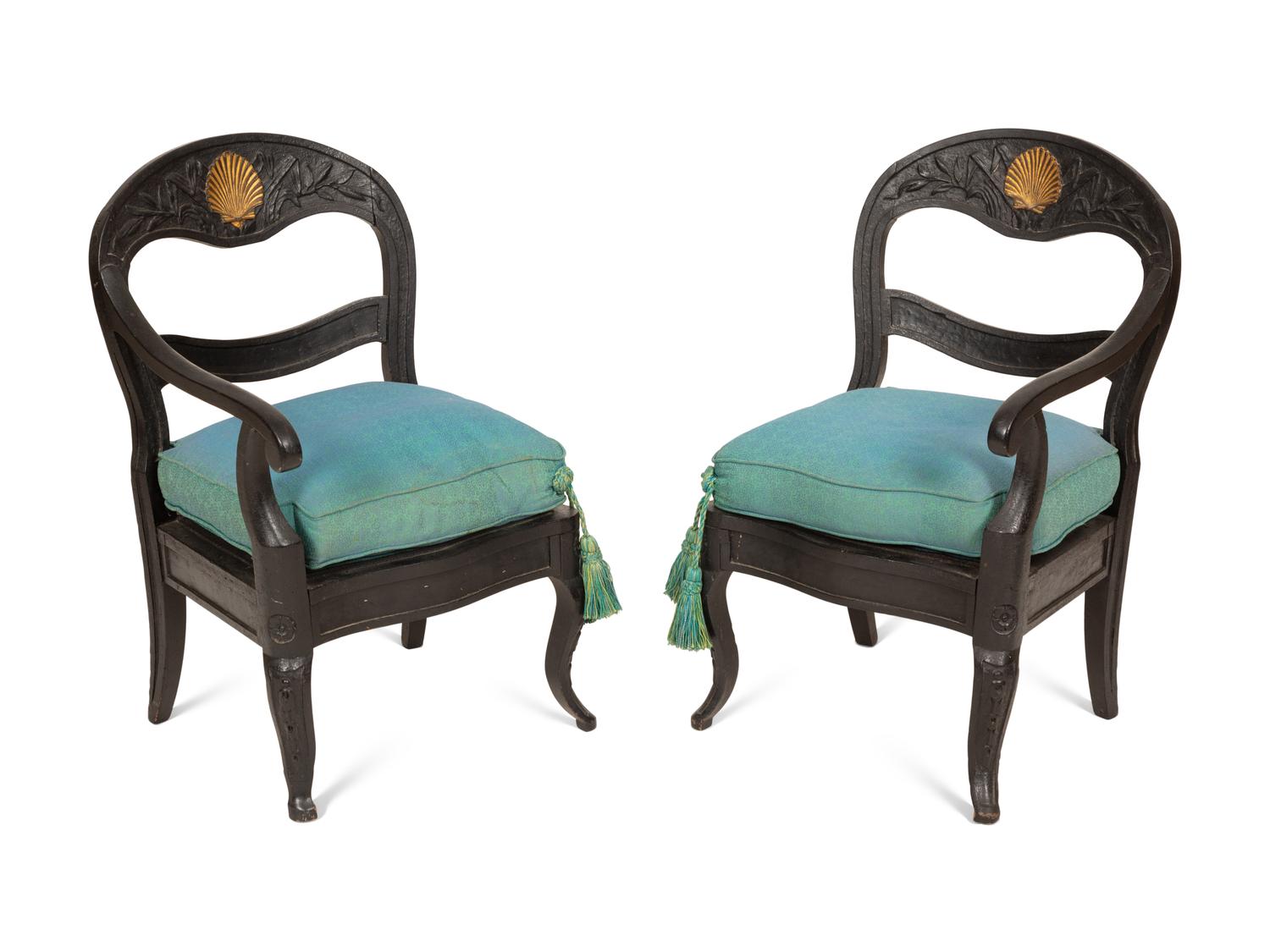 A Pair of Italian Black-Painted and Parcel Gilt Gondola Chairs