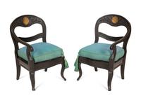 A Pair of Italian Black-Painted and Parcel Gilt Gondola Chairs