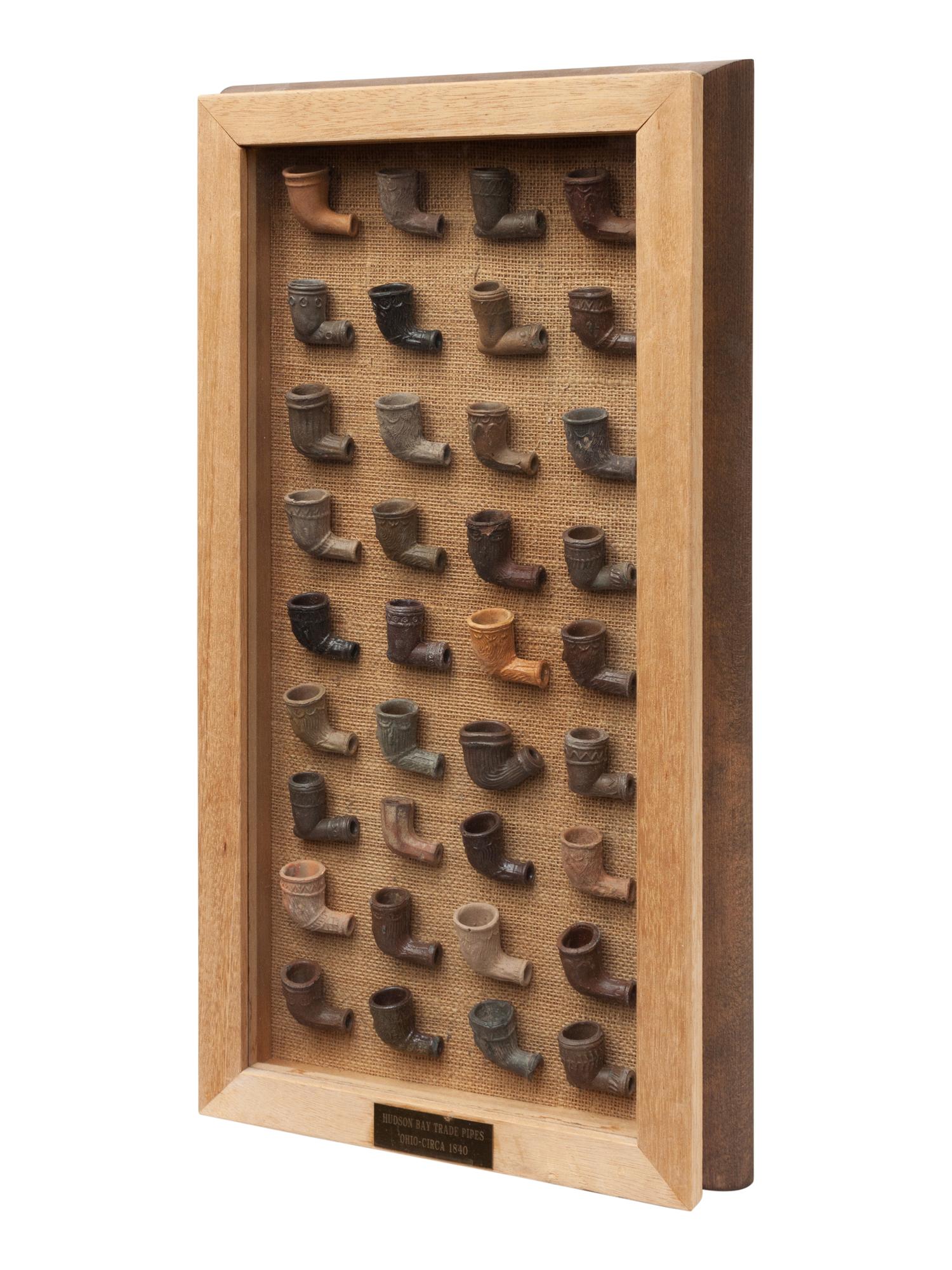 Four Framed Collections of Indian Chewing Gum, Tokio Tobacco Silks and Hudson Bay Trade Pipes