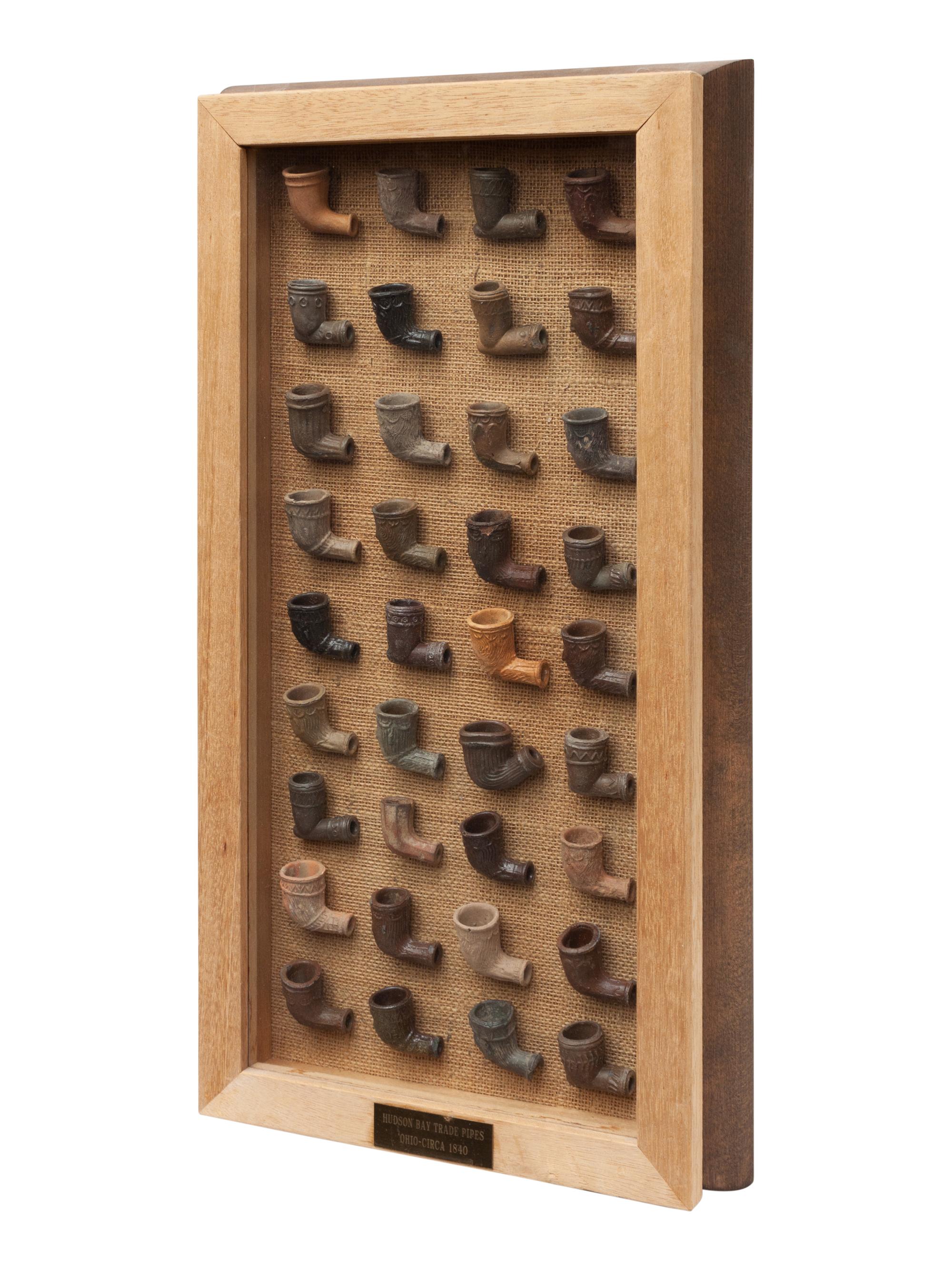 Four Framed Collections of Indian Chewing Gum, Tokio Tobacco Silks and Hudson Bay Trade Pipes