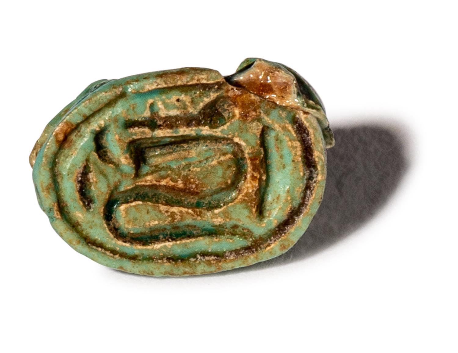 Four Egyptian Faience and Jasper Hedgehog Scaraboids